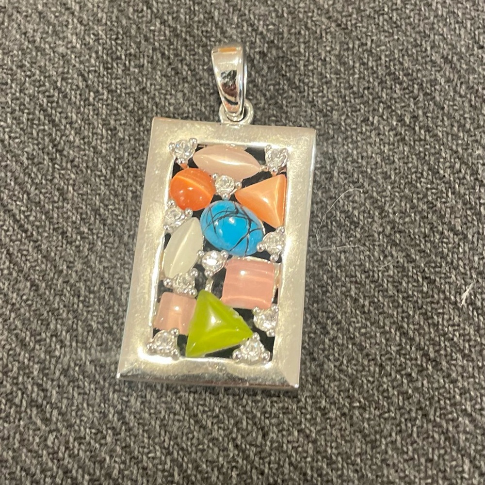 Gorgeous Silpada pendant with multicolored stones and gems. Silver.